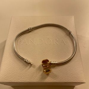 Pandora, Sterling silver with 14k gold clasp.